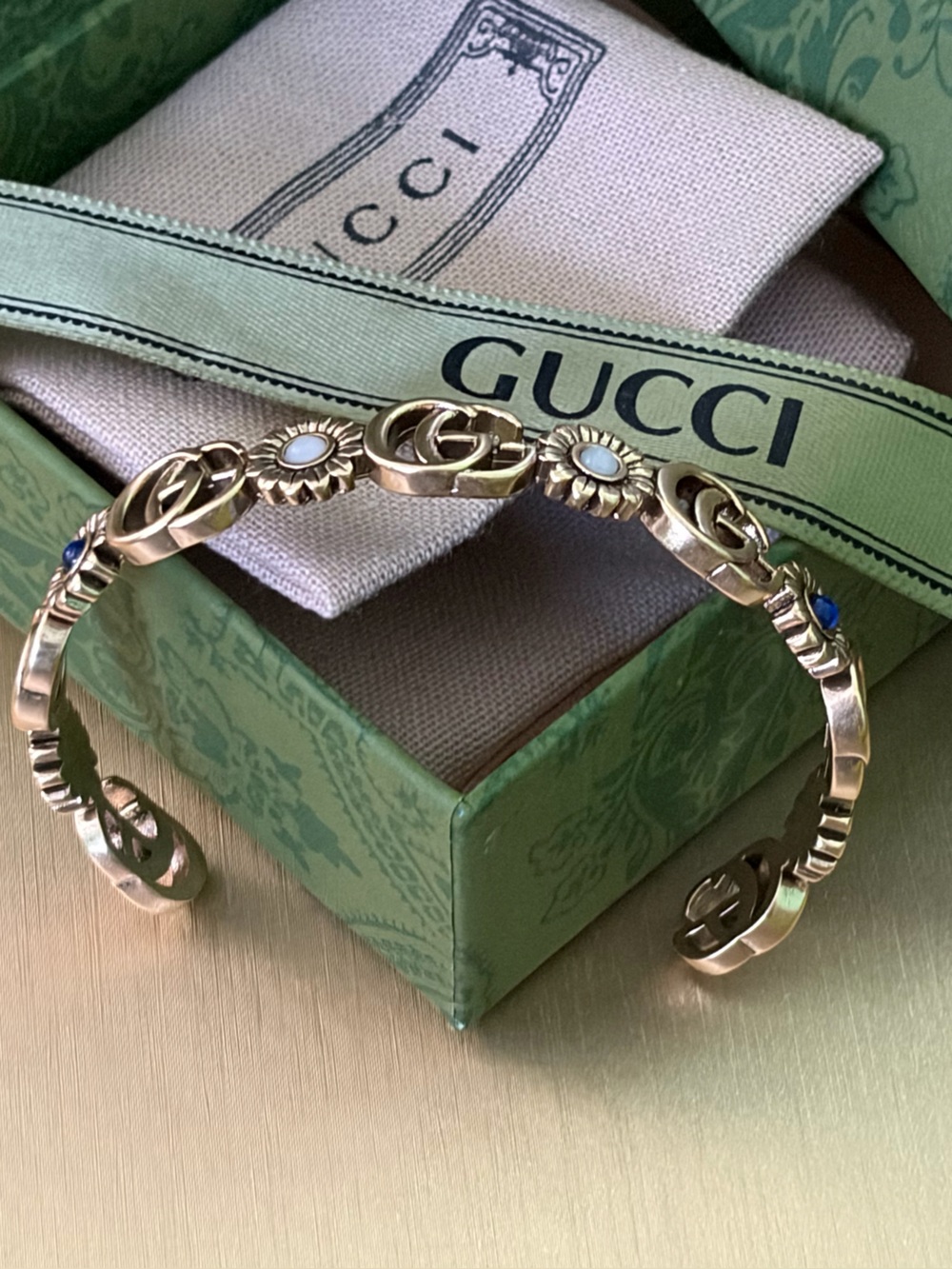 Gucci Gold Plated GG Cuff Flower Bracelet